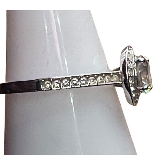 Size 7 ring, stamped 55, clear stones silver color band - Picture 6 of 11